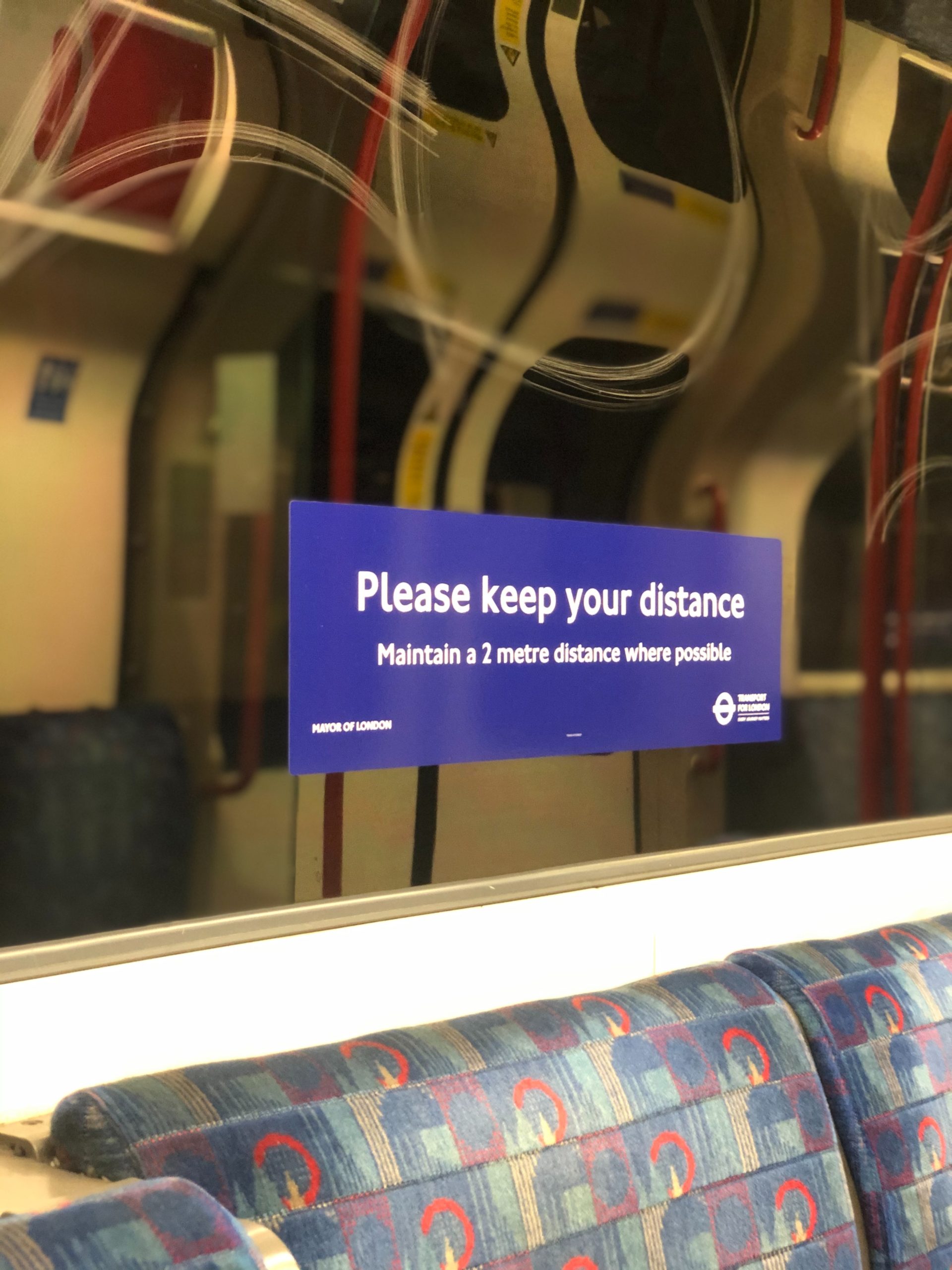 Social distance sign on Tube