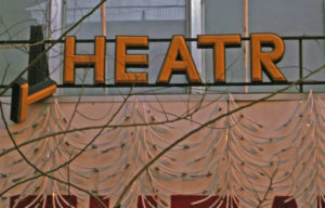 A broken Theatre sign